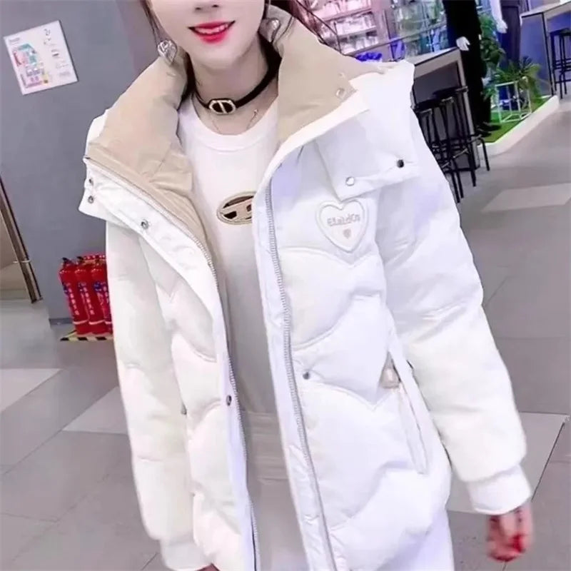 Black women's winter parka jacket by Corporación Turística, warm and stylish for cold weather.