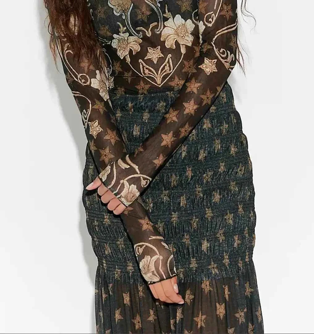 Elegant black women's flowing skirt with a long, voluminous design, perfect for stylish and comfortable wear.