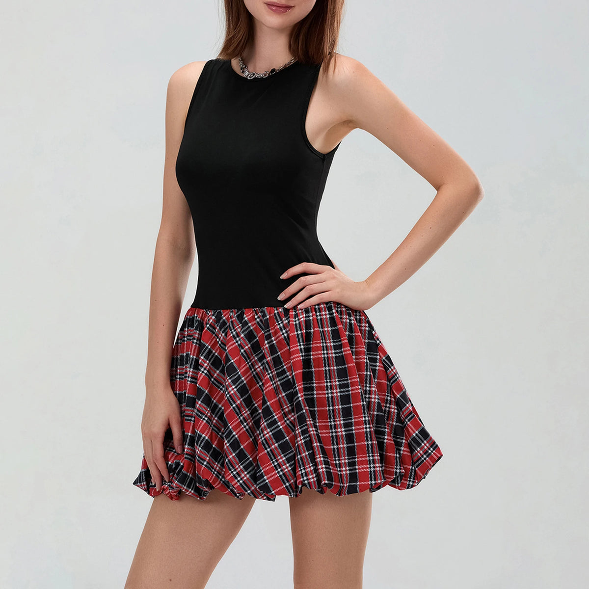 Black sleeveless mini dress for women by Corporación Turística, stylish and form-fitting without sleeves.