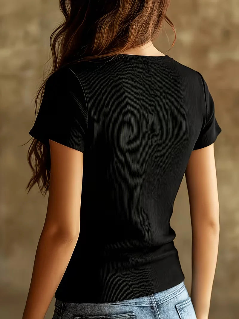 Black summer women's T-shirt from Corporación Turística, lightweight and stylish with a flattering fit and unique neckline design.