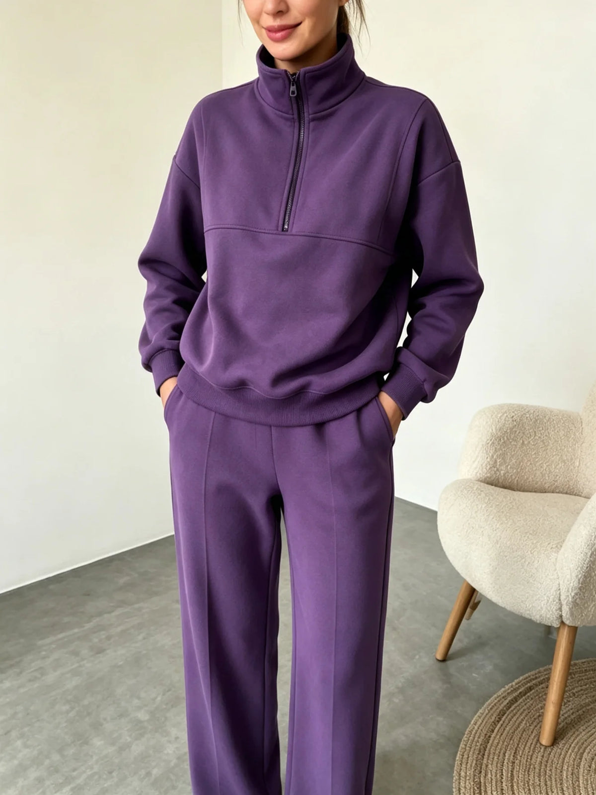 Black sweatshirt set with half-zip and matching pants by Corporación Turística, casual athletic wear for comfortable style.