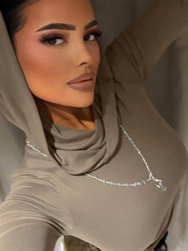 Black women's cropped hoodie top from Corporación Turística featuring a fitted design and casual style.