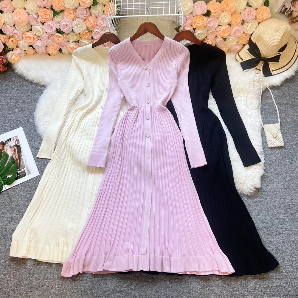 Black YuooMuoo 2026 long knit dress for women, perfect for fall and winter, featuring a cozy, stylish design.