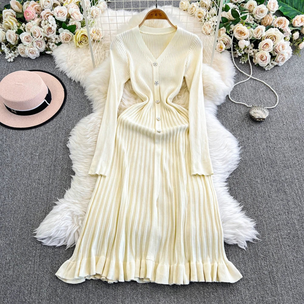 Black YuooMuoo 2026 long knit dress for women, perfect for fall and winter, with a relaxed, comfortable fit.