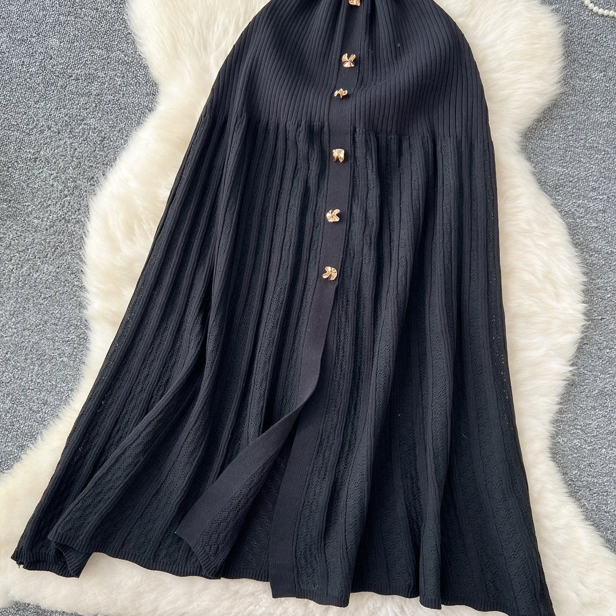 Elegant black patchwork woven maxi dress by YuooMuoo, featuring stylish design and comfortable fit for sophisticated fashion.