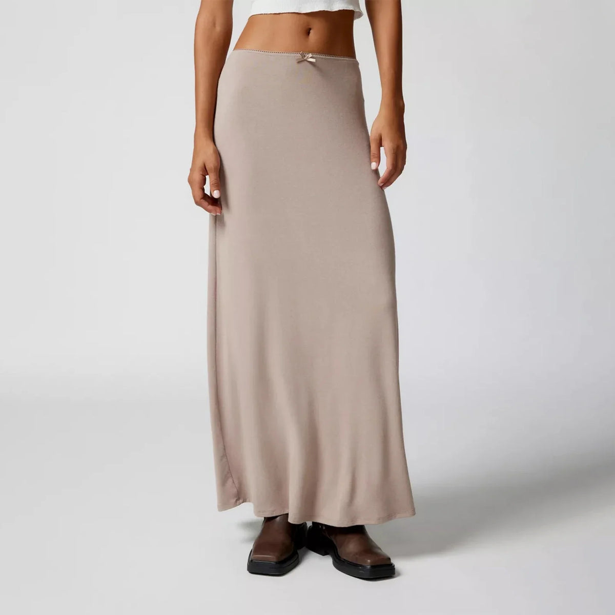 Long casual women's skirts by Corporación Turística, black straight-fit skirts with simple design and comfortable fabric.