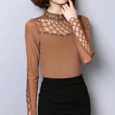 Black women's long sleeve blouse by Corporación Turística, stylish and comfortable shirt for casual or formal wear.