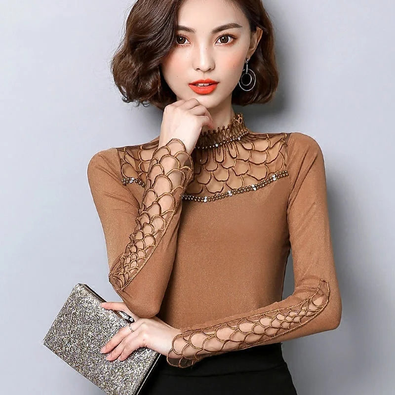 Black women's blouse by Corporación Turística, long-sleeve fashion shirt, casual and stylish for everyday wear.