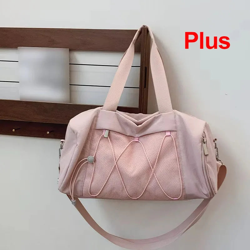 Black gym and travel bag for women and men by Corporación Turística, showing a spacious, durable duffel bag with handles and zippers.