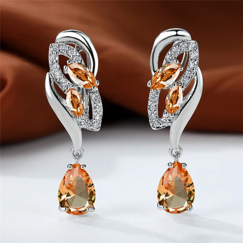 Luxury rainbow blue stone earrings for women featuring vibrant, colorful gemstone pendants with elegant gold accents.