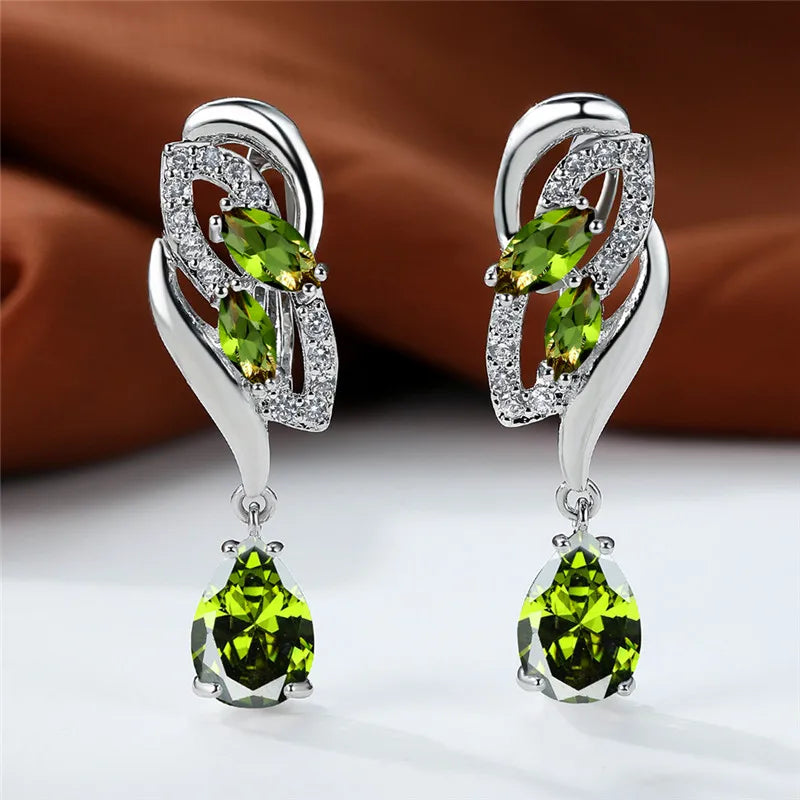 Blue rainbow stone luxury earrings for women, featuring elegant arch-shaped design with vibrant gemstone accents.