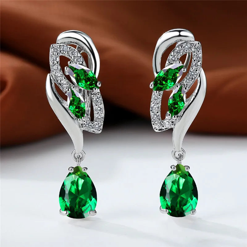 Luxury blue rainbow stone earrings for women featuring elegant arc-shaped design and vibrant gemstone details.