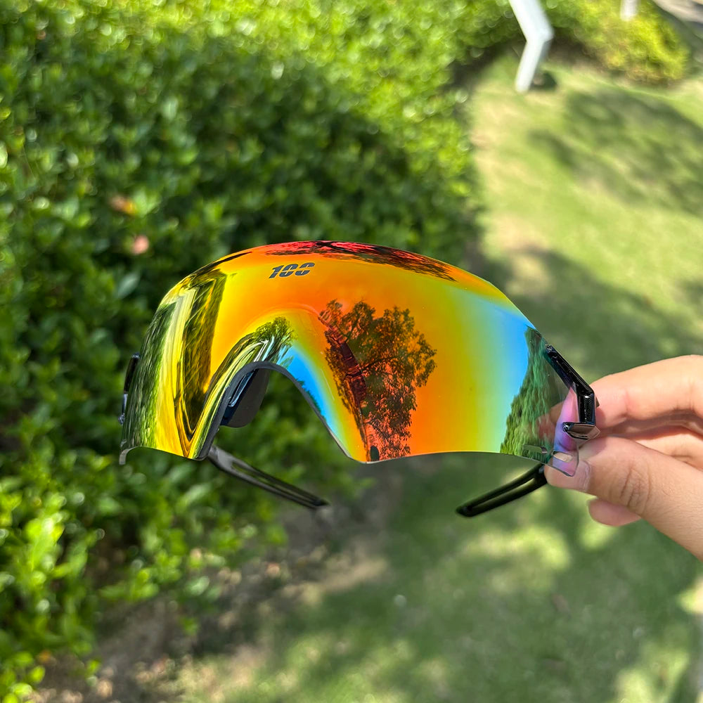 Corporación Turística photochromic cycling glasses with UV400 protection for men, suitable for mountain biking, road cycling, running, and sports.