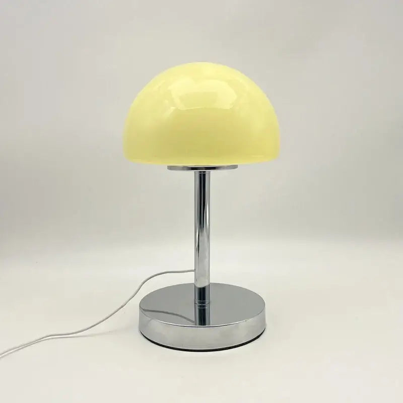 Crystal table lamp with mushroom-shaped glass shade and coiled base, stylish decor piece by Corporación Turística.