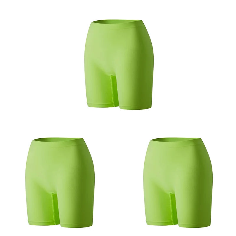 Set of three orange women's safety shorts by Corporación Turística, featuring adjustable waistband and reflective details.