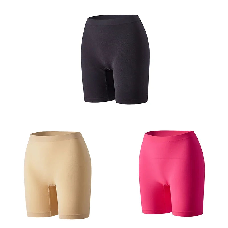 Set of three orange women's safety shorts by Corporación Turística, lightweight and durable for outdoor activities.