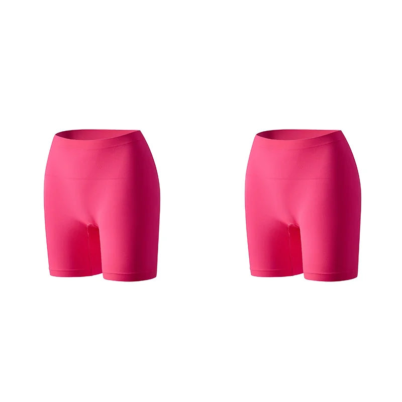 Set of three orange women's safety shorts by Corporación Turística, featuring durable fabric and adjustable waistbands.