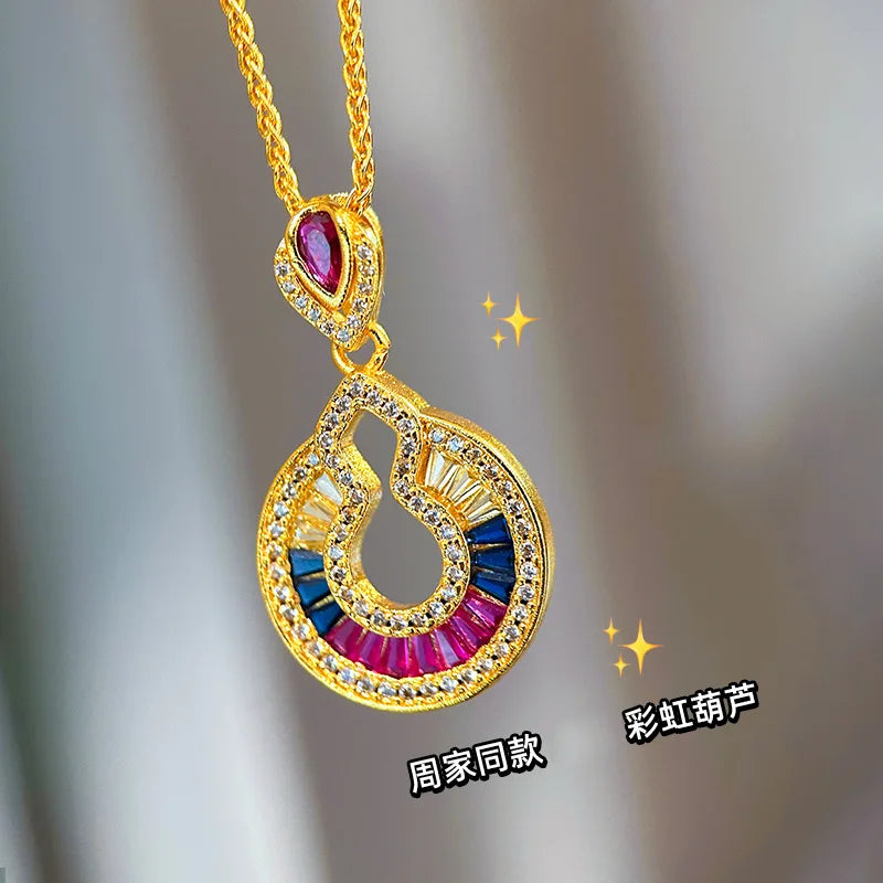 Luxury gold necklace with diamond pendant, 24K real gold, from Corporación Turística, featuring an elegant and sparkling design.