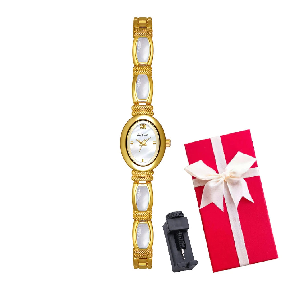Elegant women's bracelet watch with oval dial by Corporación Turística, featuring a sleek gold-tone finish and classic design.