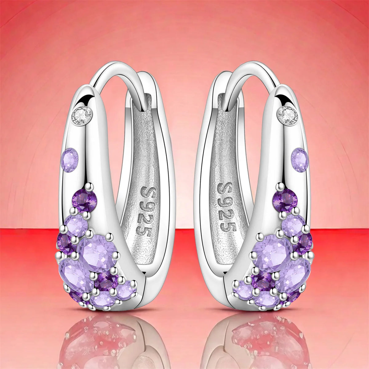 Silver S925 PANPOKI earrings with sparkling cubic zirconia from Corporación Turística, featuring elegant and shiny jewelry design.