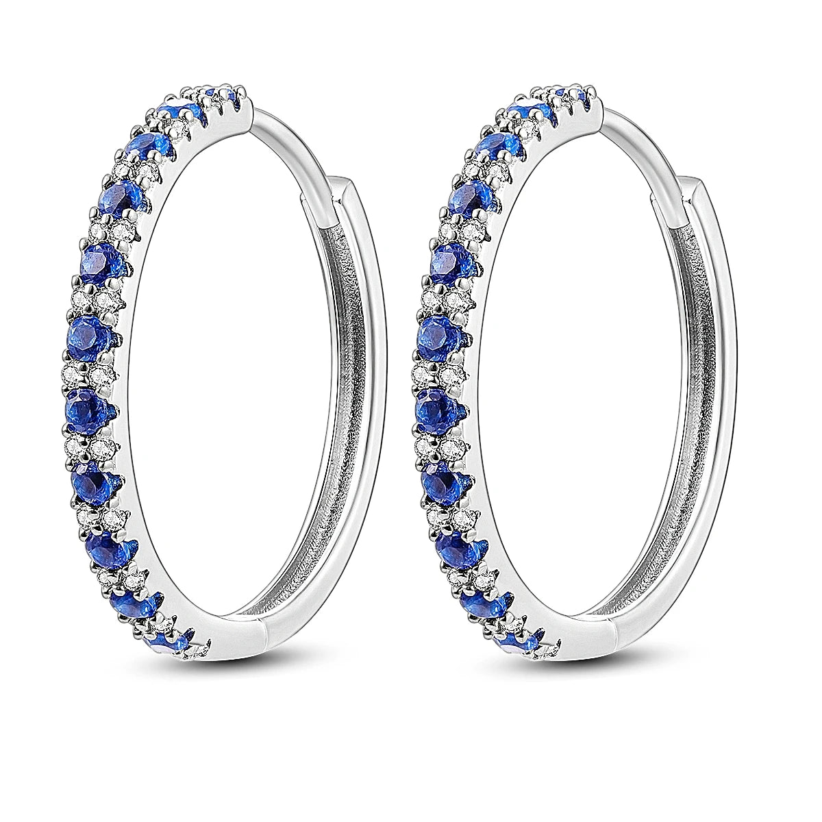 Sterling silver Orstarry earrings with blue cubic zirconia by Corporación Turística, showcasing elegant dangle design.