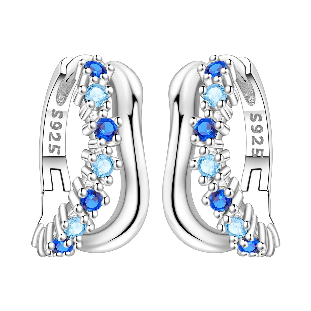 Sterling silver Orstarry earrings with blue cubic zirconia by Corporación Turística, featuring a polished design with sparkling stones.