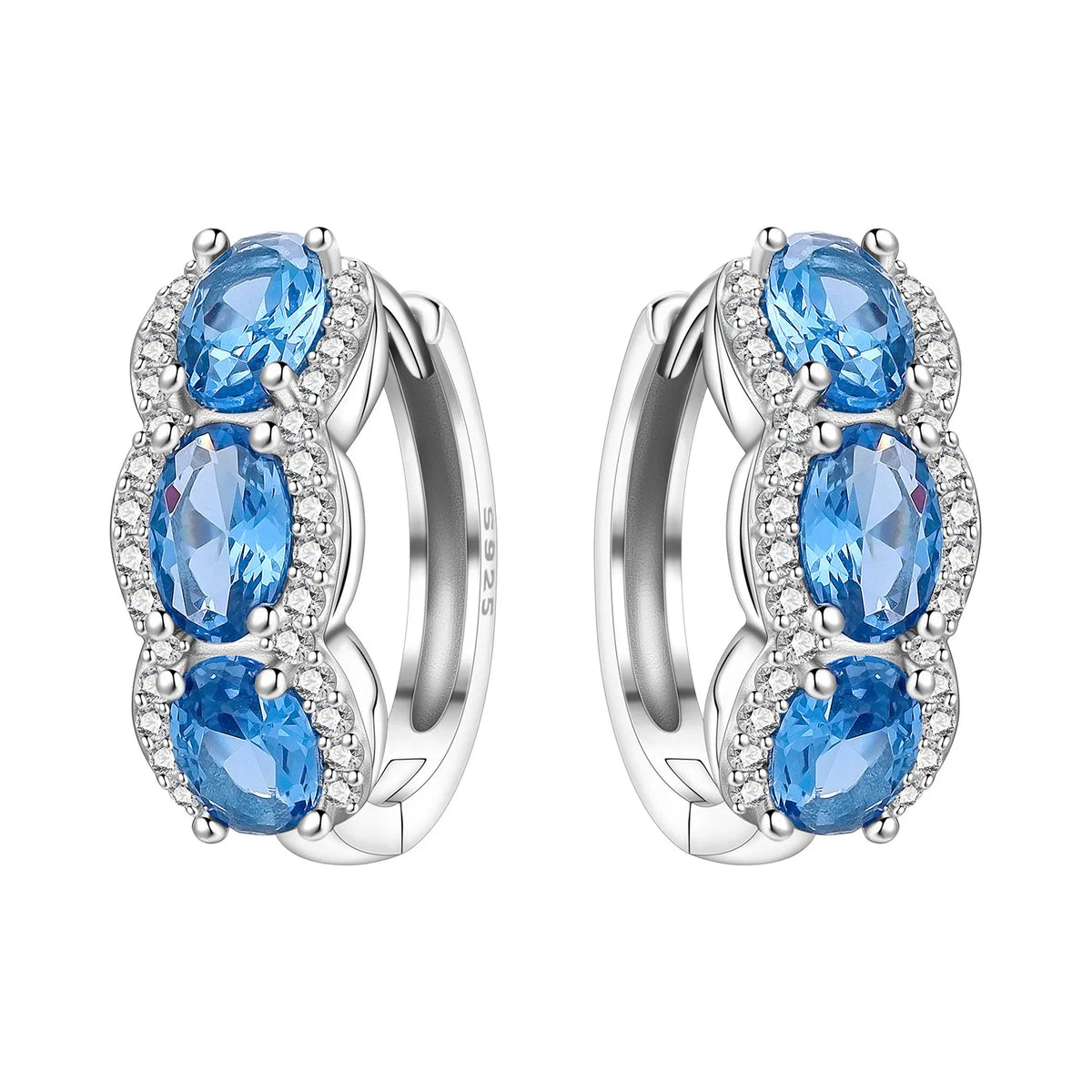 Sterling silver Orstarry earrings with blue cubic zirconia from Corporación Turística, showcasing elegant dangle design.