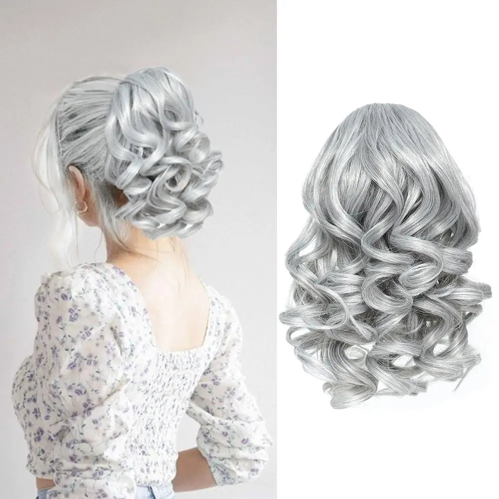 Short curly ponytail extensions with cord from Corporación Turística, showing the textured, wavy hair style and secure cord attachment.