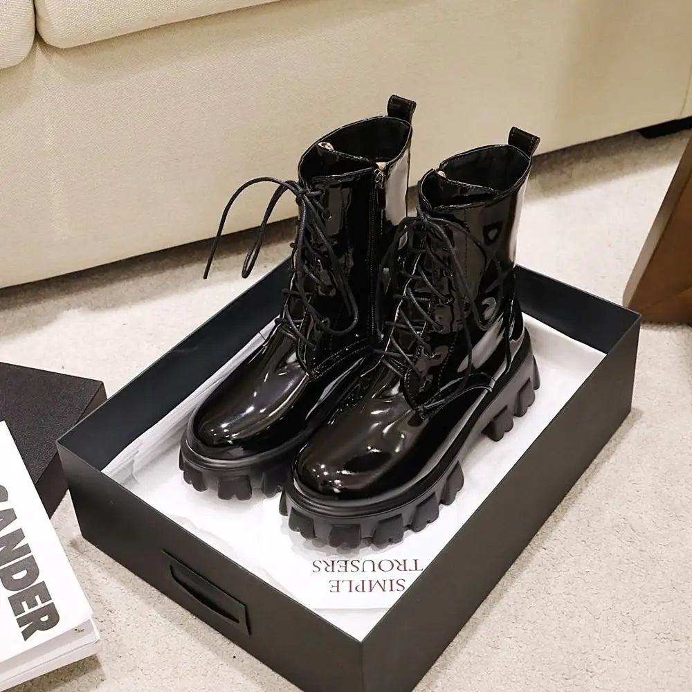 White patent leather platform ankle boots for women with short plush lining, stylish and trendy footwear by Corporación Turística.