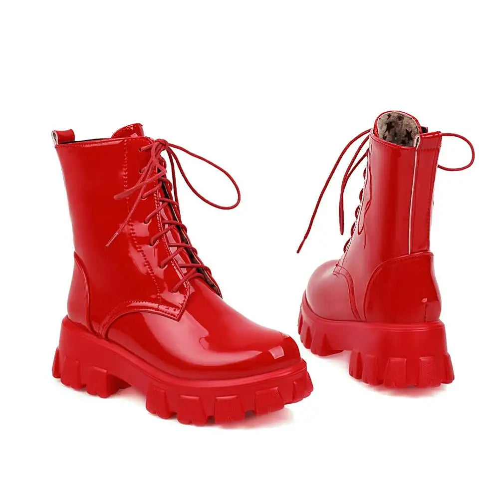 White patent leather platform ankle boots for women with plush short lining, stylish and trendy footwear by Corporación Turística