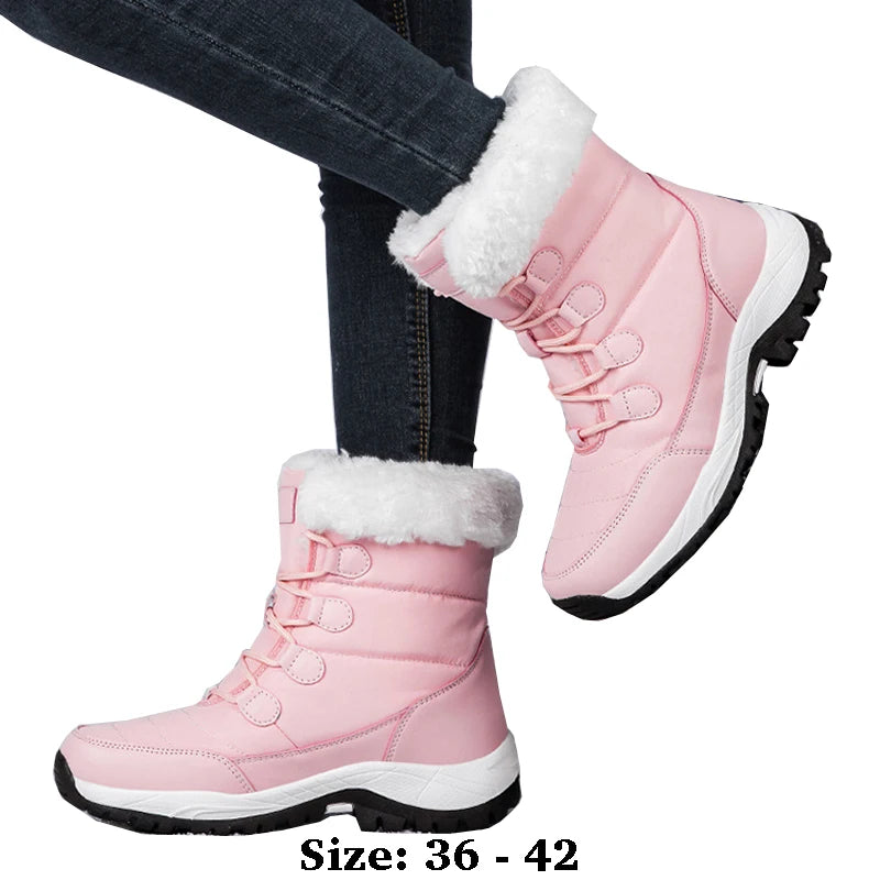 Pink ankle-length cotton snow boots from Corporación Turística, showcasing high warmth and cozy winter footwear.