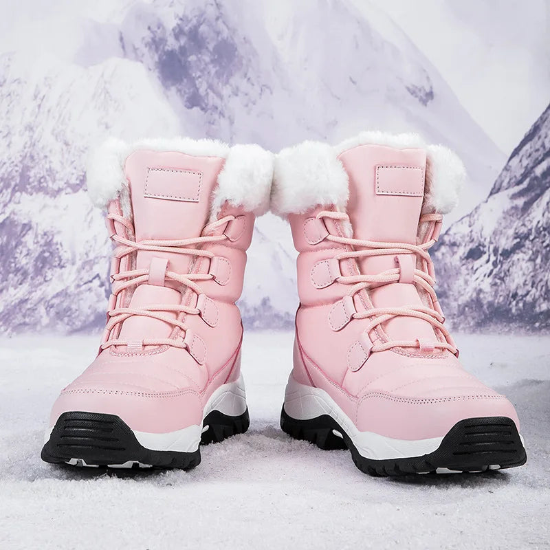 Pink cotton ankle snow boots from Corporación Turística, high warmth and cozy for winter wear, with a plush interior.