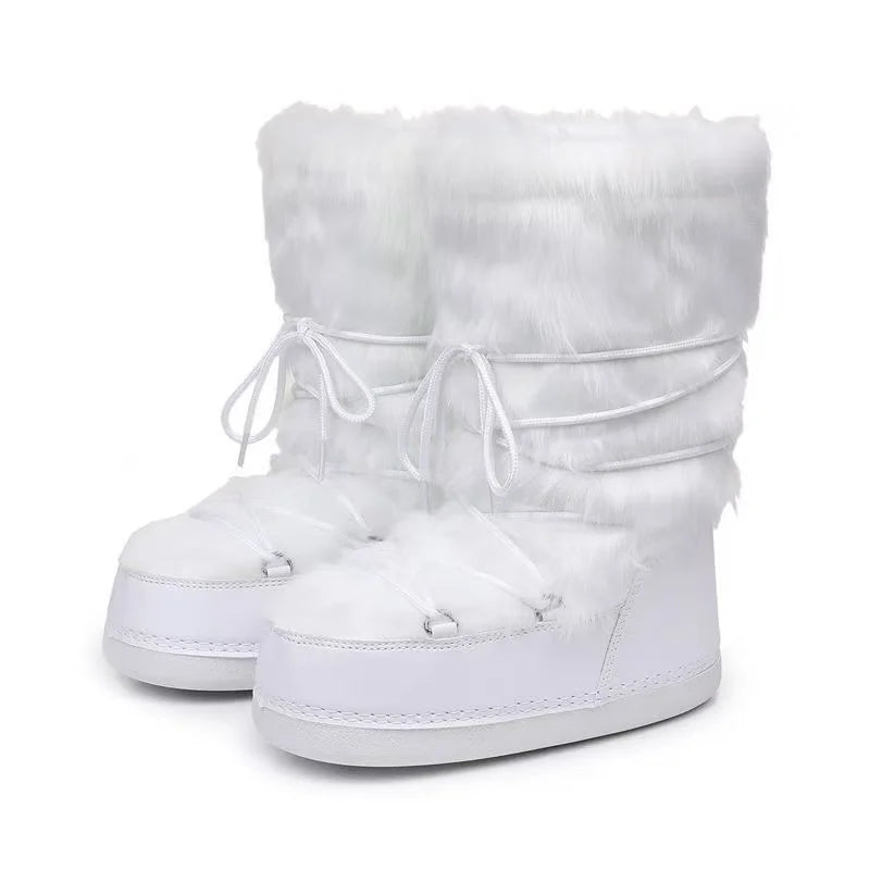 High-end pink women's snow boots by Corporación Turística, with thick soles and insulated design for winter warmth.
