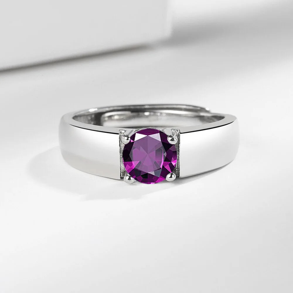 Silver 925 Moissanite ring for men, featuring a polished band and sparkling gemstone, ideal for stylish masculine jewelry.