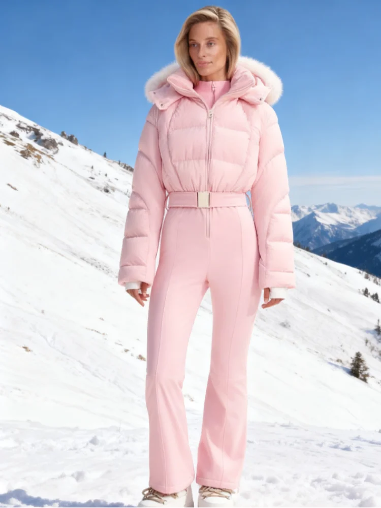Elegant pink women's ski jumpsuit made of thick leather, featuring a sleek design and functional ski gear by Corporación Turística.