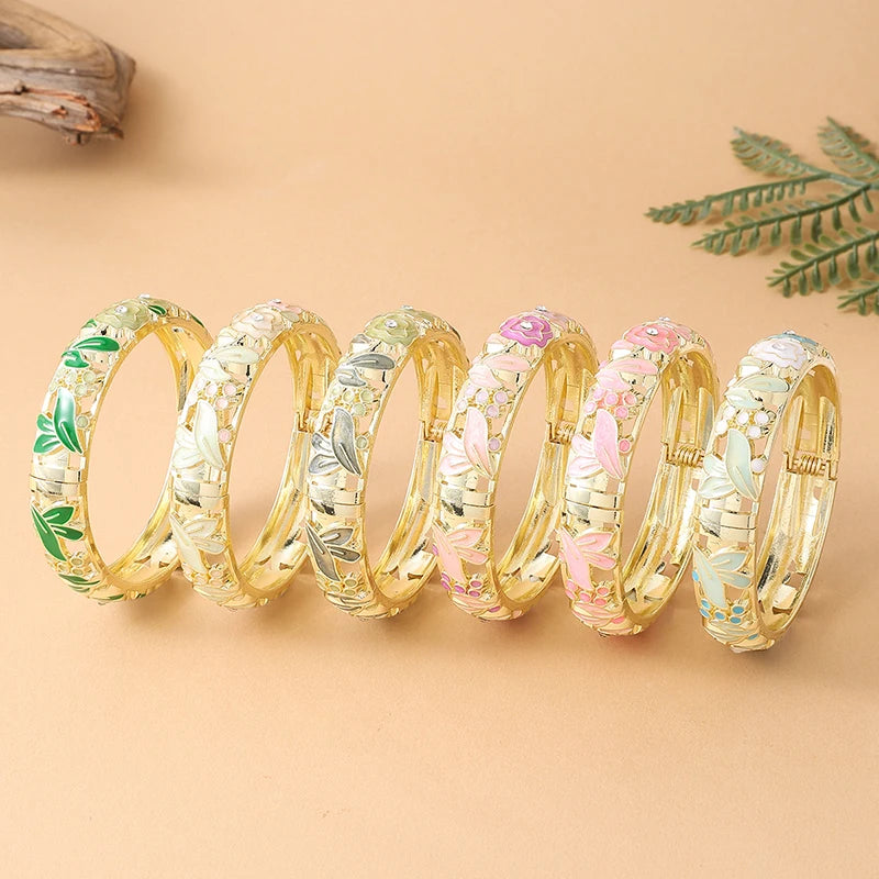 Pink floral enamel bracelet for women featuring rose flower designs, by Corporación Turística.