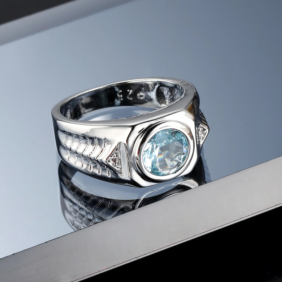 Blue cubic zirconia and aquamarine gemstone rings from Corporación Turística, featuring elegant silver band designs.