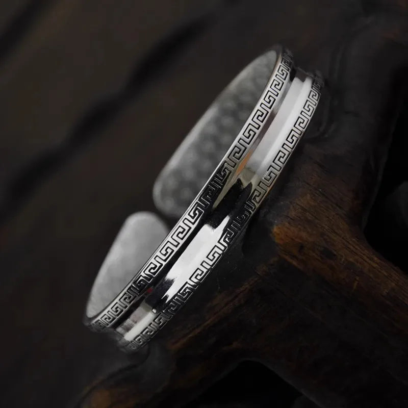 Circular textured silver bracelet in 925 sterling silver for men, featuring a sleek design and polished finish.