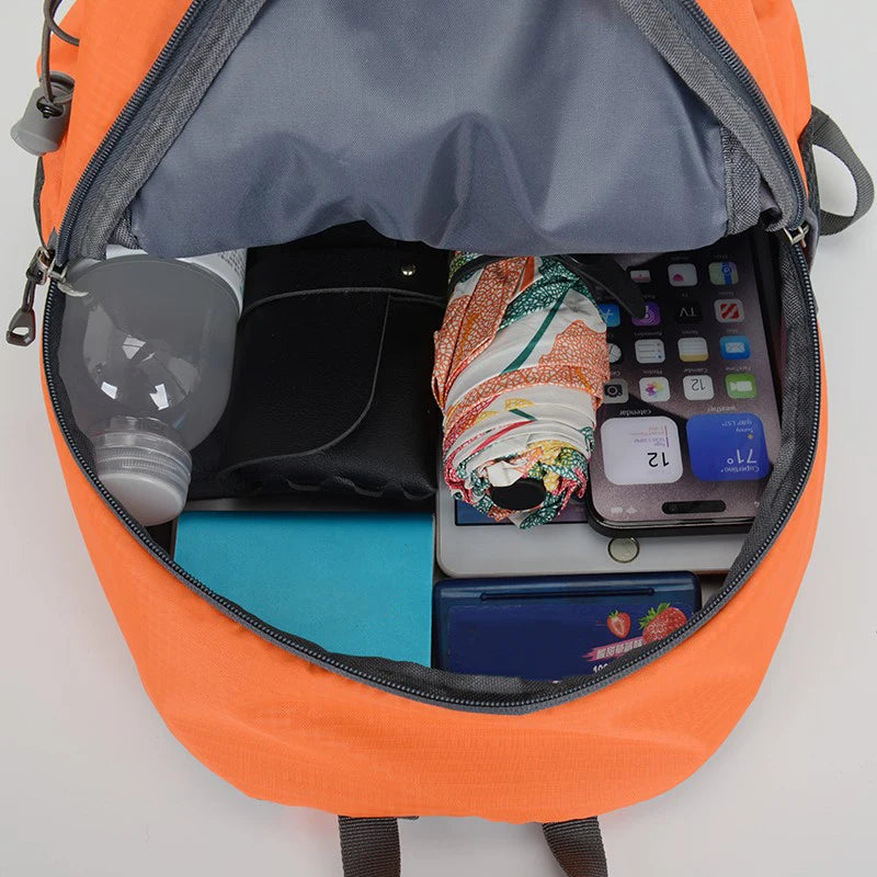Camping backpack and travel bag for hiking by Corporación Turística, showing durable straps and spacious compartments.