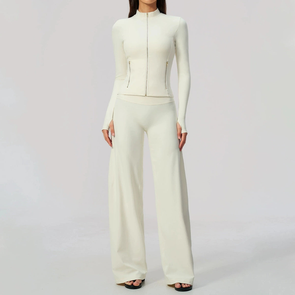 Black women’s sports outfit by Corporación Turística with yoga top and matching leggings, suitable for activewear and yoga practice.