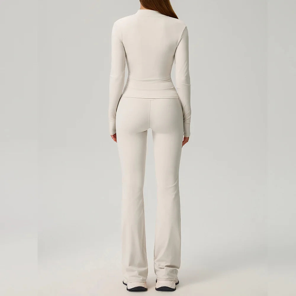 Black 2-piece women's sports set by Corporación Turística, including a matching athletic top and leggings for active wear.