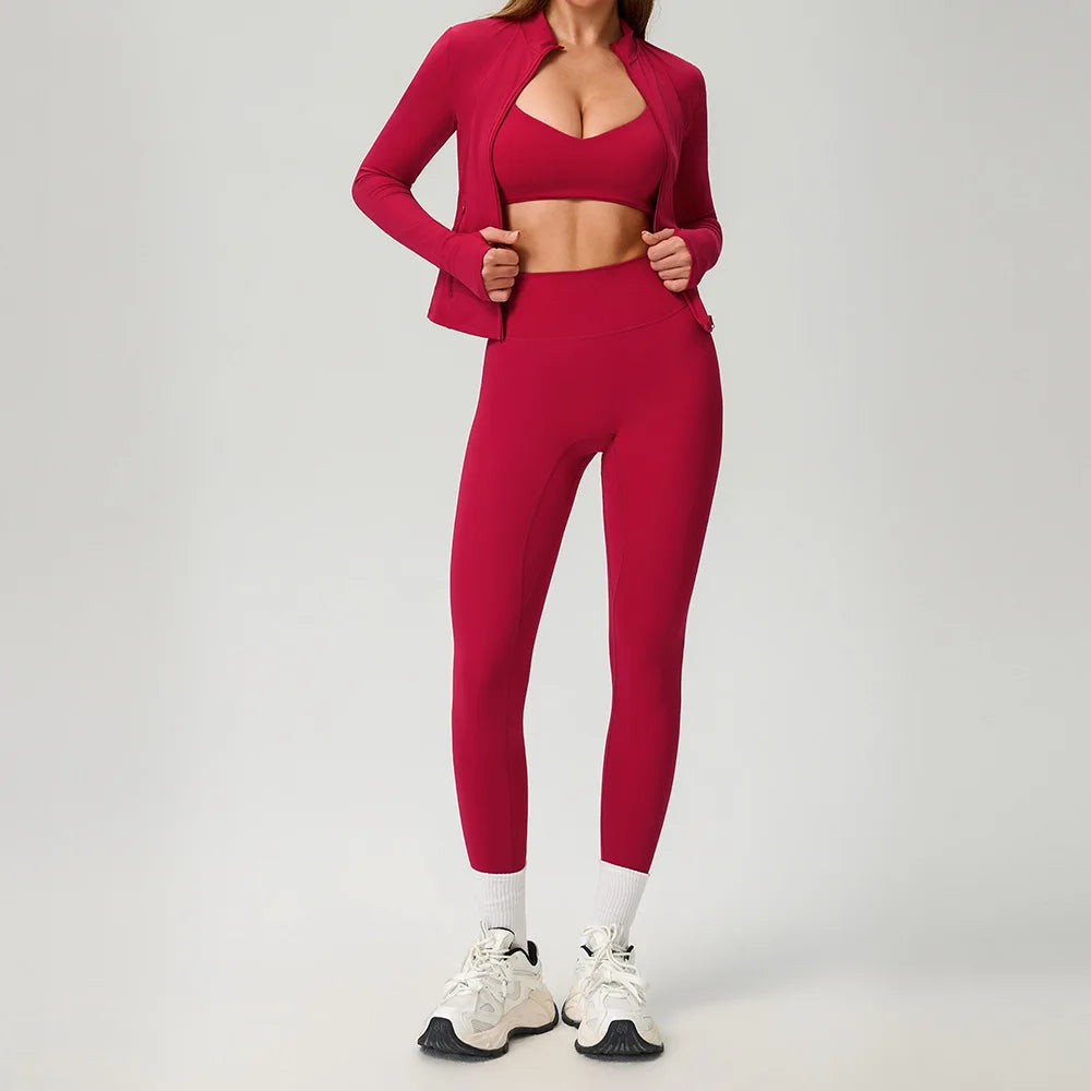 Black 2-piece women's sports set by Corporación Turística, featuring a sporty top and matching pants for active wear.