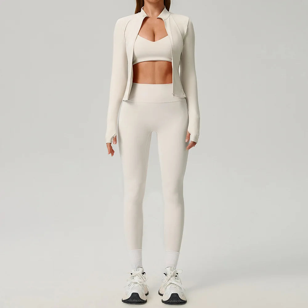Black 2-piece women's sports set by Corporación Turística, featuring a sporty top and matching leggings for activewear.