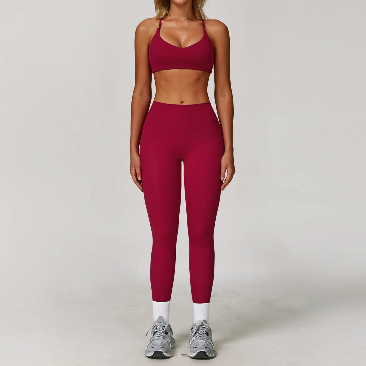 Black 2-piece women's yoga set by Corporación Turística including a fitted top and matching leggings, ideal for activewear.