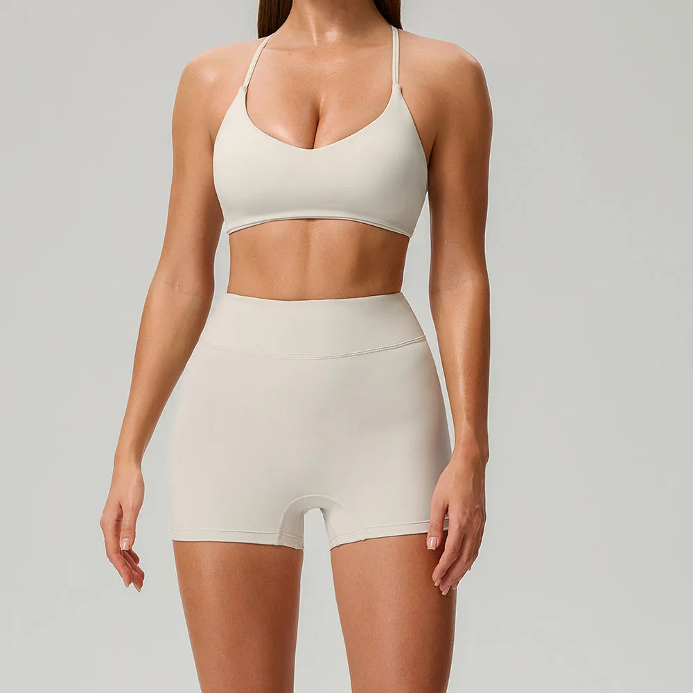 Black 2/3-piece women's yoga set by Corporación Turística featuring comfortable sportswear for active workouts.
