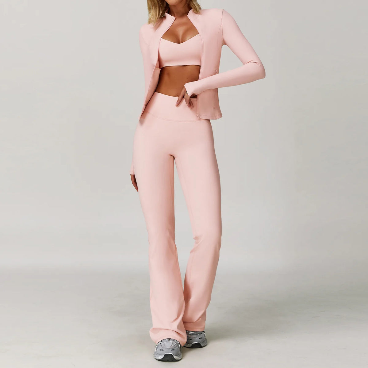 Black women's yoga set with two or three pieces, including a sports top and leggings, by Corporación Turística.
