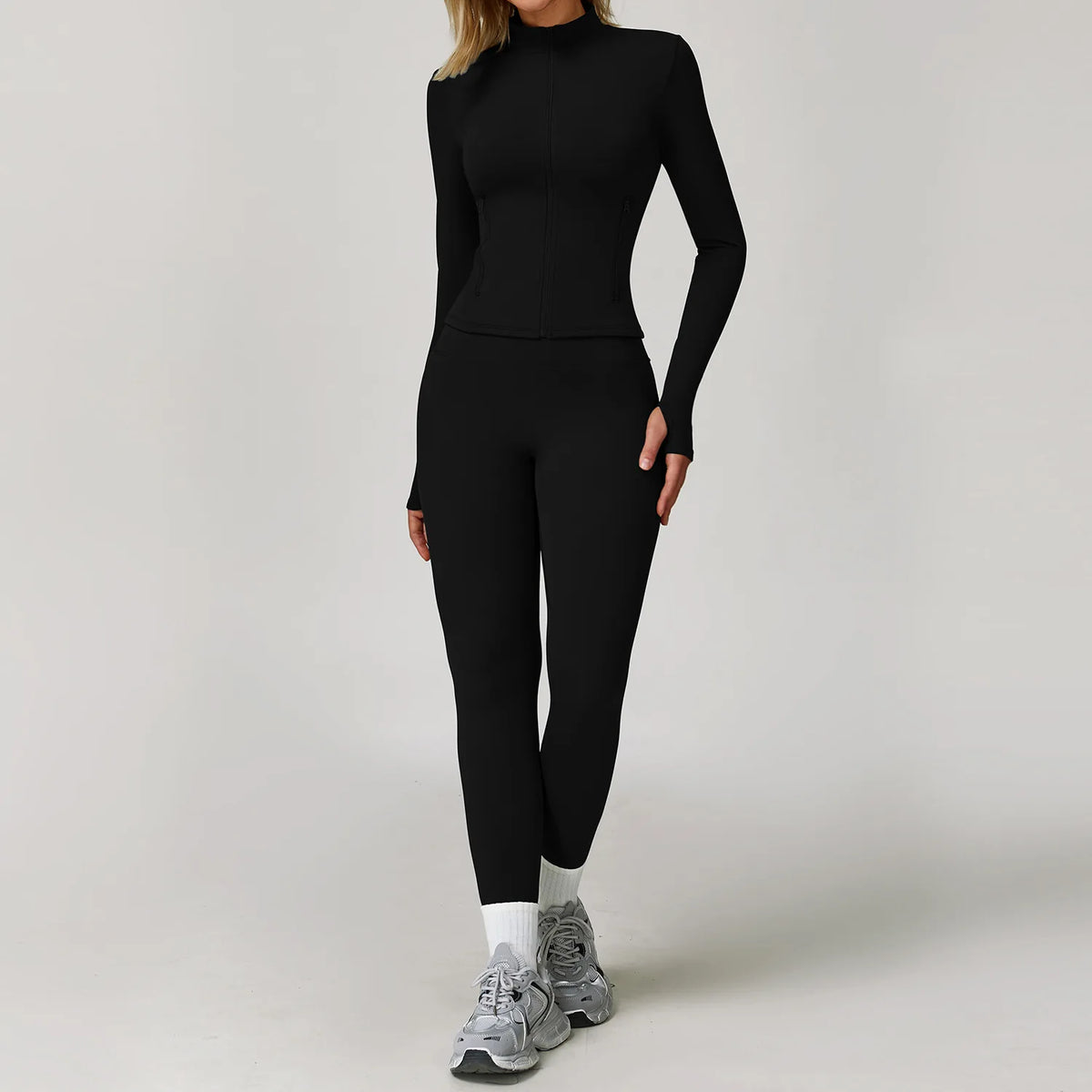 Black 2-piece yoga set for women by Corporación Turística, includes sports bra and leggings, suitable for exercise and active wear.