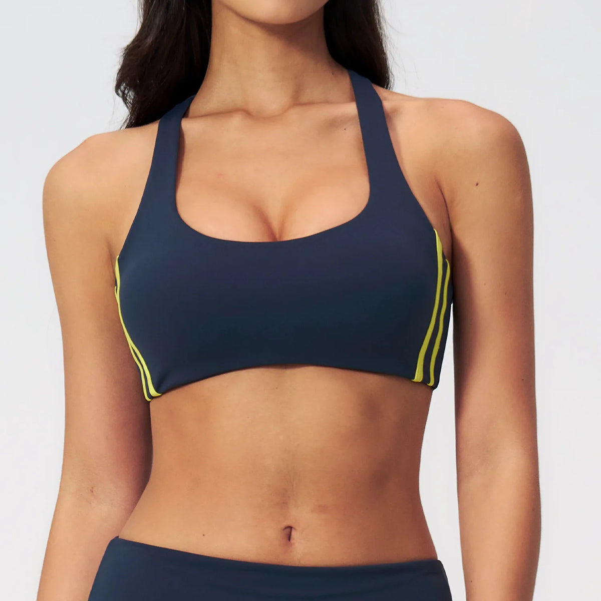 Black women's yoga top by Corporación Turística, quick-drying athletic shirt with a comfortable fit for active wear.