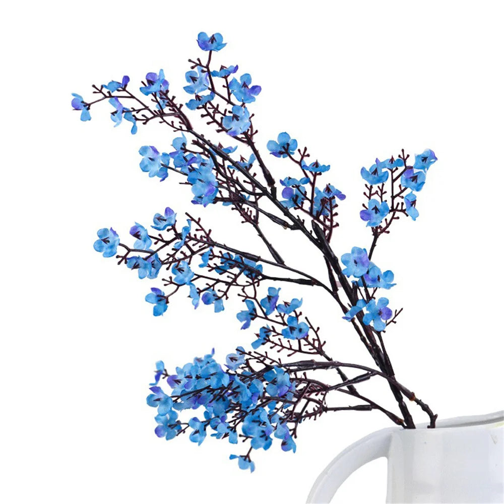 Two artificial Gypsophila flowers in purple, realistic fake flowers for decoration, from Corporación Turística.