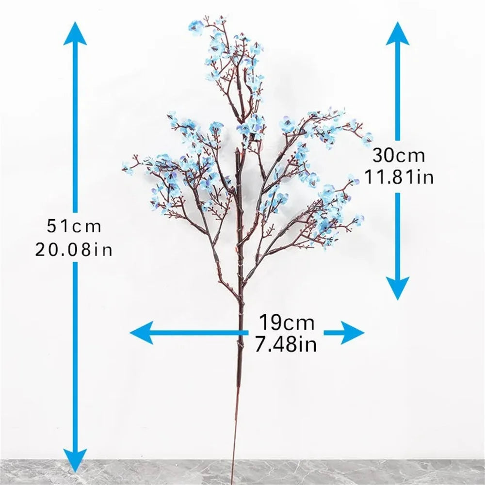 Two purple artificial Gypsophila flowers from Corporación Turística, realistic faux floral arrangement for home decor.